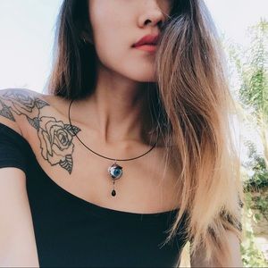 Custom made black tear drop eye necklace